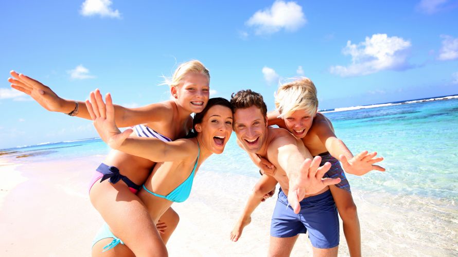 Family, kids in the sea, Mauritius